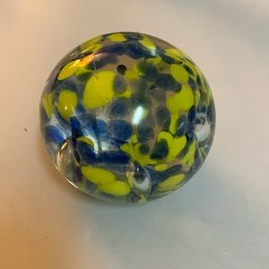 Blue and yellow round paperweight